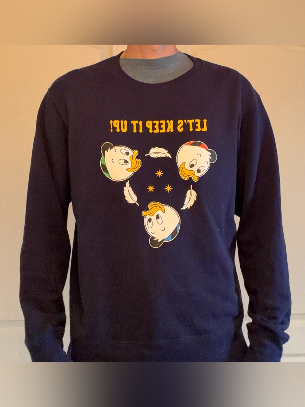 Men's Uniqlo Navy Disney 'Let's Keep It Up!' Cartoon Crewneck Sweater